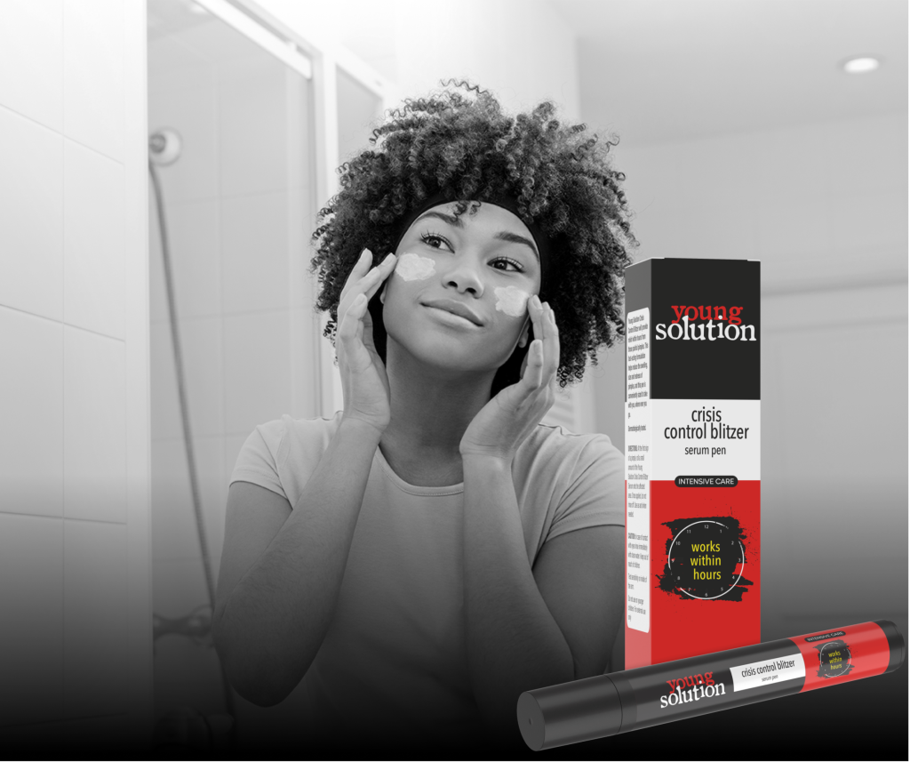 a photo of a young woman applying a skincare product to her cheeks
